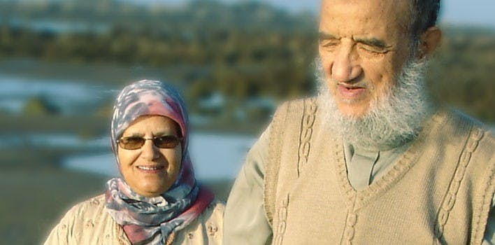 مع زوجه السيدة خديجة المالكي رحمها الله